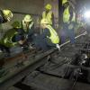 SFMTA Track Maintenance installs new rails at the Embarcadero Crossover 