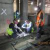 Specialized electronic maintenance technicians work hand-in-hand with track maintenance