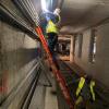 Subway engineers from Mechanical Systems restore and replace lighting systems throughout the tunnel
