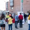 Event attendees visiting a Muni Heritage booth