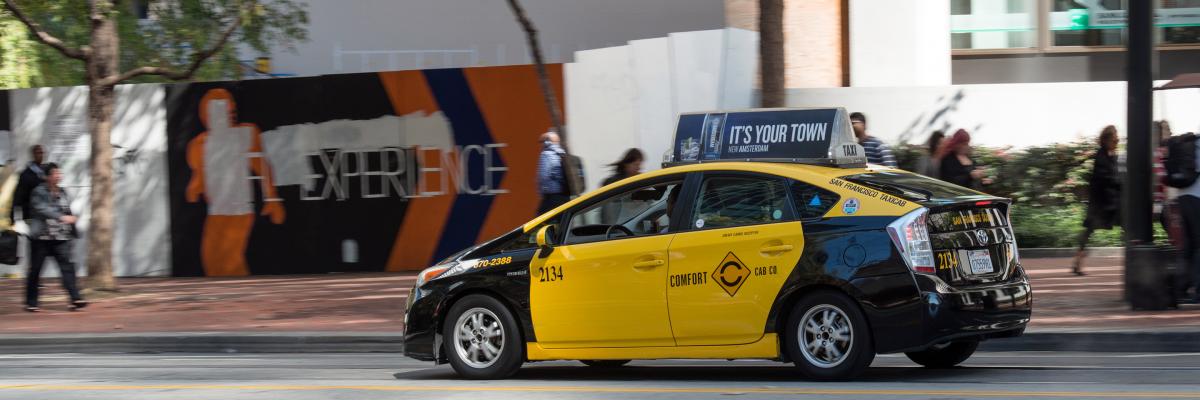 Taxi cab driving on Market Street
