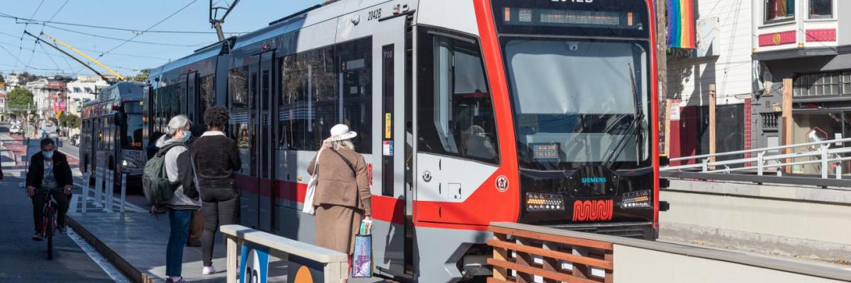 riders boarding j church at platform 