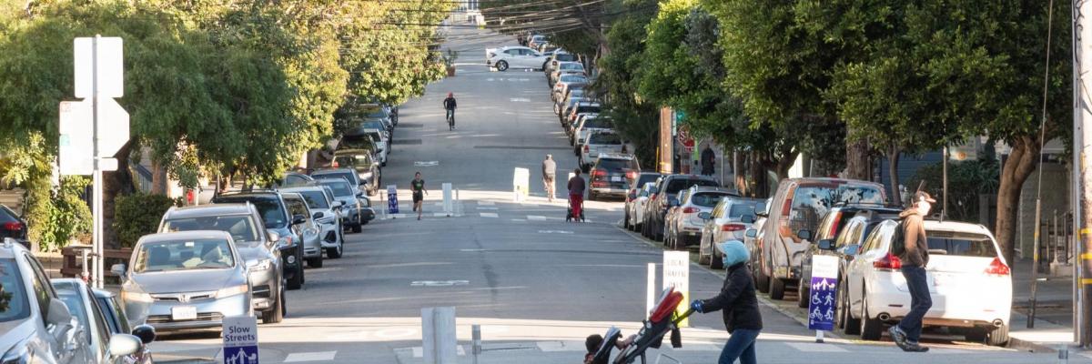 People walking on a Slow Street