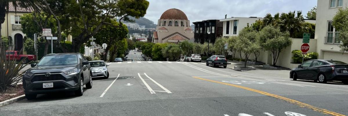 Image of Arguello boulevard with cars parked on either side.