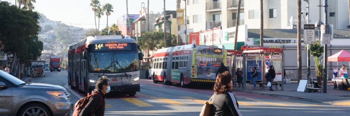 People and Transit on 24th and Mission During Morning Rush Hour