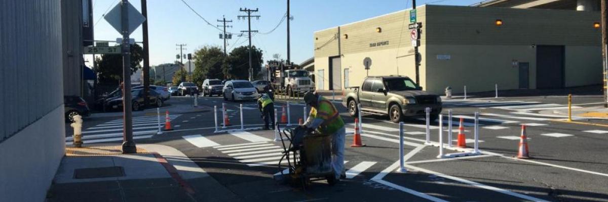 SFMTA paint shop installing quick build designs on indiana