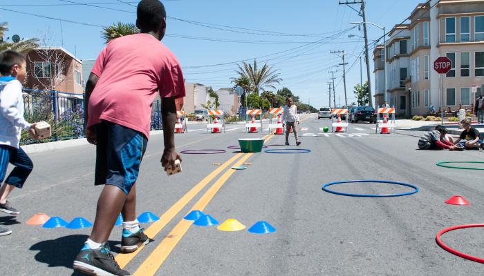 Children playing at a Play Streets block party