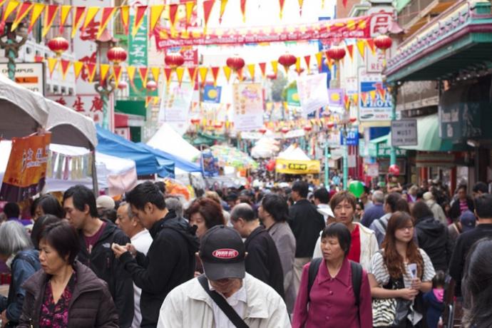 A crowded street at the Autumn Moon Festival in Chinatown.