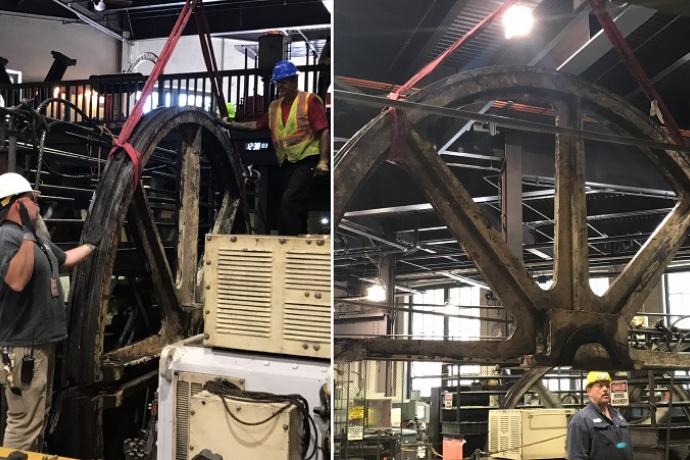 Photos of mechanics deconstructing a large, wheel-shaped sheave in the cable car barn and powerhouse.