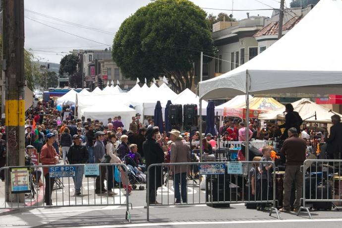 A crowd of people fills and tents fill Diamond Street during the 2014 Glen Park Festival.