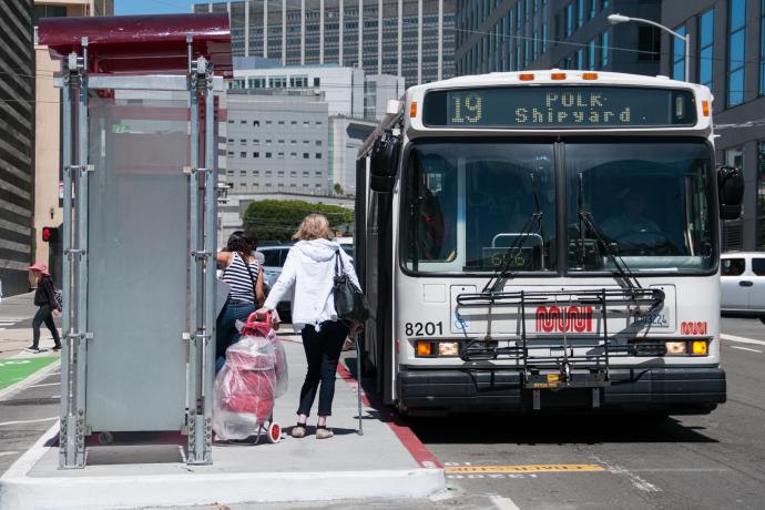 19 polk bus at stop on 8th street