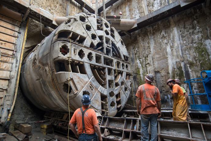 Tunnel boring machine Mom Chung emerging from the TBM retrieval shaft in North Beach