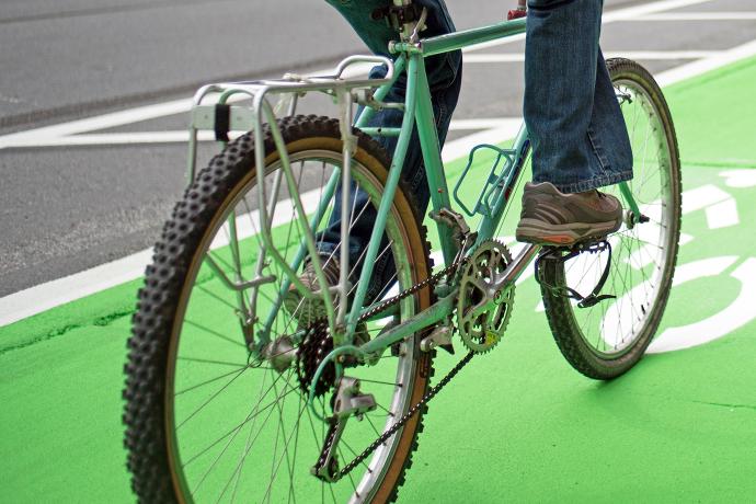 Green bike lane in San Francisco with bicyclist