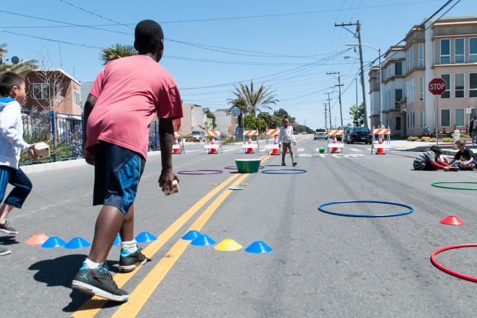 Children playing at a Play Streets block party