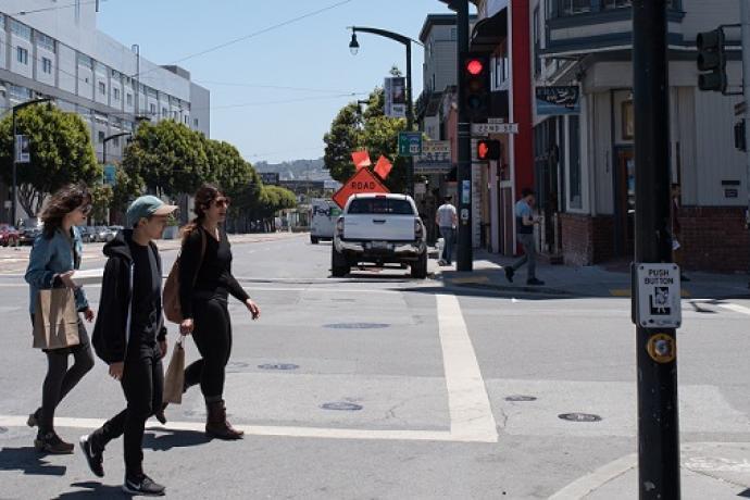 People crossing the street in Dogpatch.