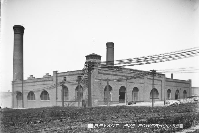brick building with smokestacks and arched windows