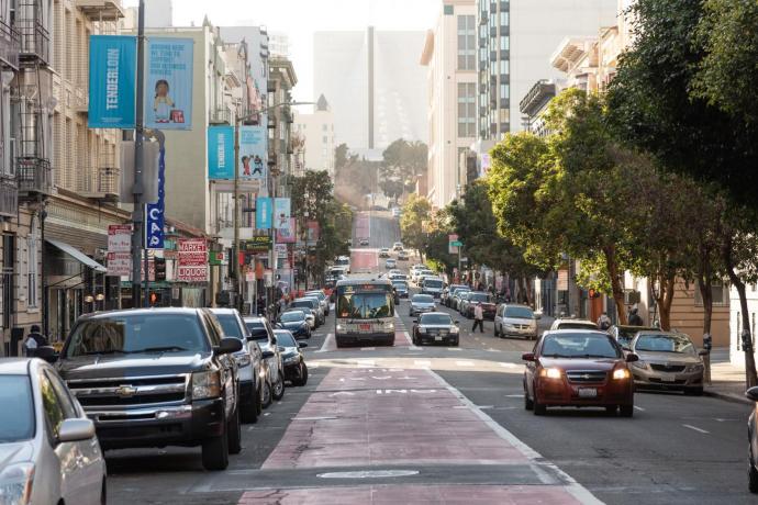 38 Geary driving on a red transit only lane in the Tenderloin