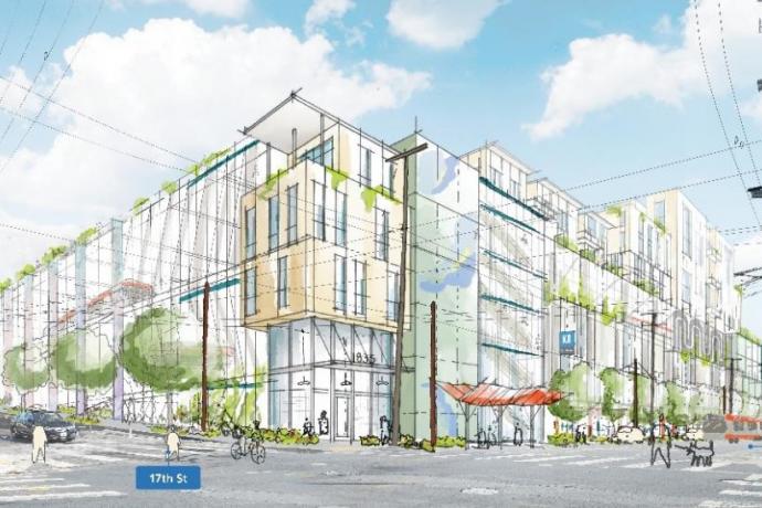 A conceptual design sketch of Potrero Yard showing a multi-story bus yard with housing above from the prospective of 17th and Br