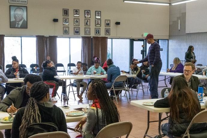 Photo of students and SFMTA staff in a Youth Summit workshop