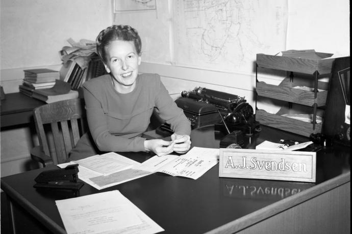 Adeline Svendsen sits at her desk in the Geneva Carhouse office building in this 1949 shot.