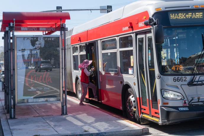 Passenger boarding a bus on Bayshore