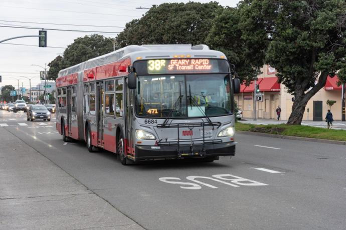 Muni bus traveling in the transit lane on Geary Boulevard