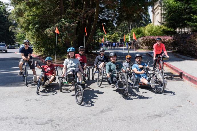 group photo of people riding adaptive cycles in Golden Gate Park