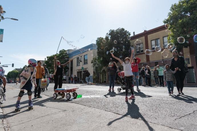 Children playing on a slow street   