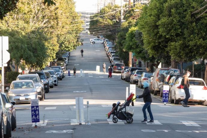 People walking on a Slow Street