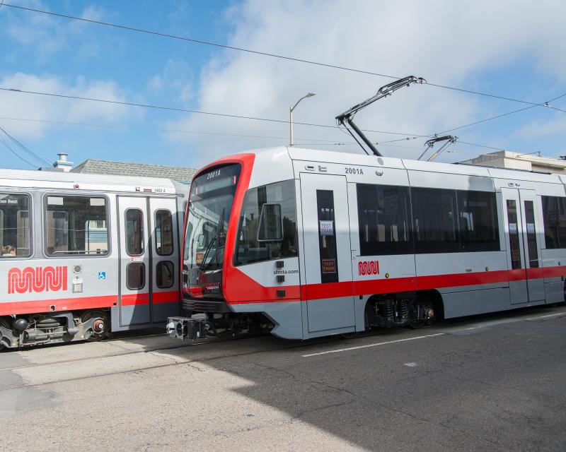 new LRV passing old LRV on N Judah Line