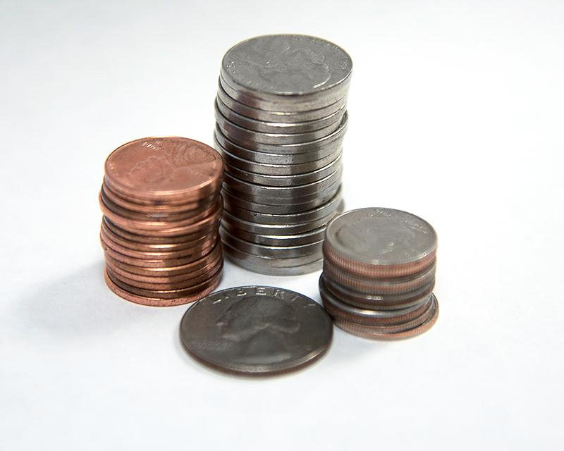 stacks of coins on white background