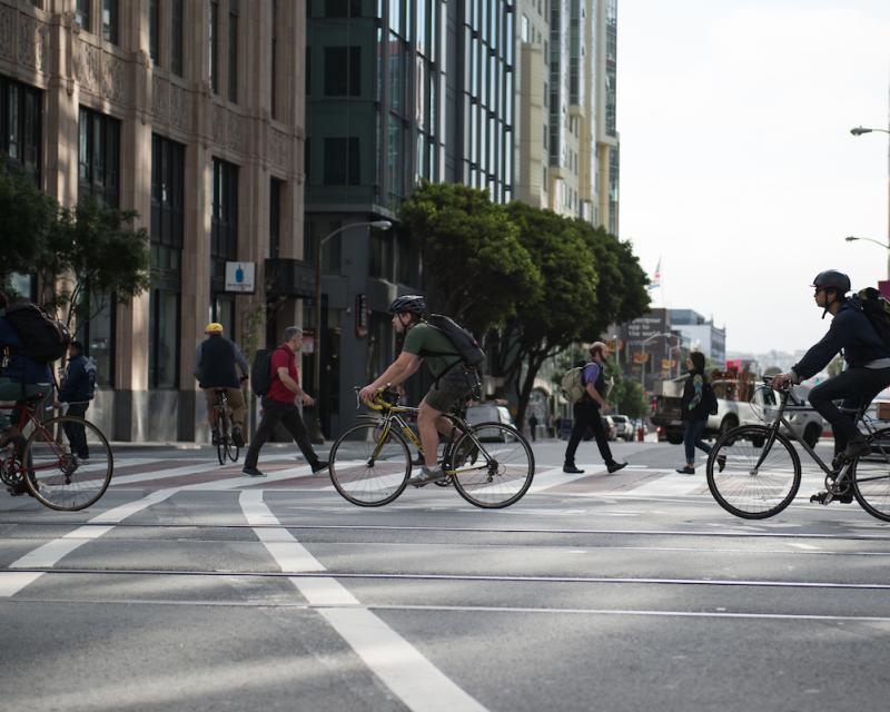 Bicyclists crossing 10th St