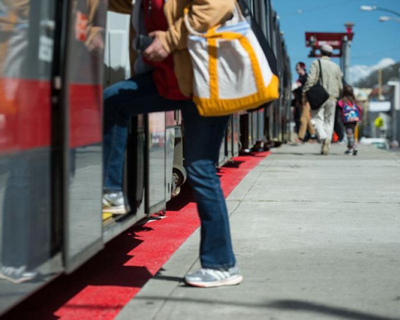 Customers board an N Judah train running on new Red Transit Lanes, March 22, 2016