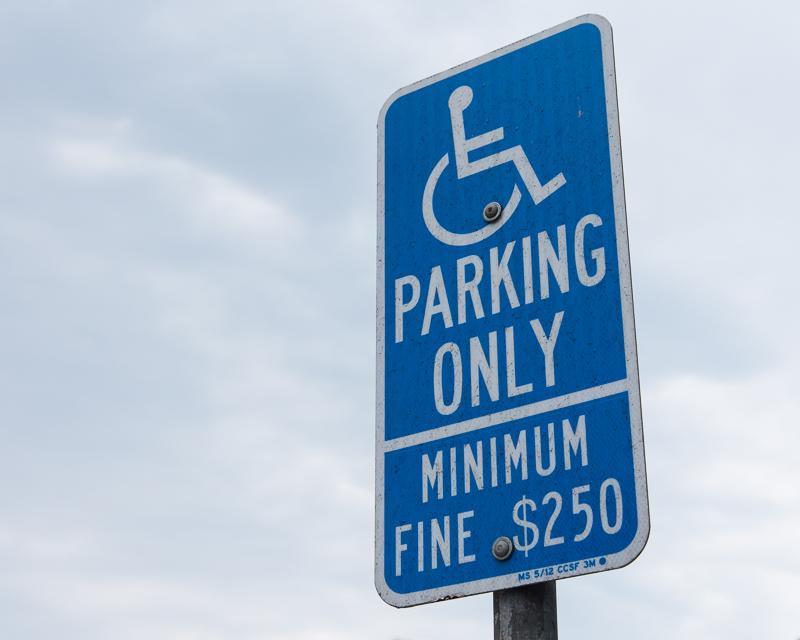 Sign indicating Disabled parking only, Mininmum fine $250