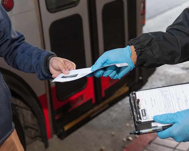 Customer receiving a transit citation