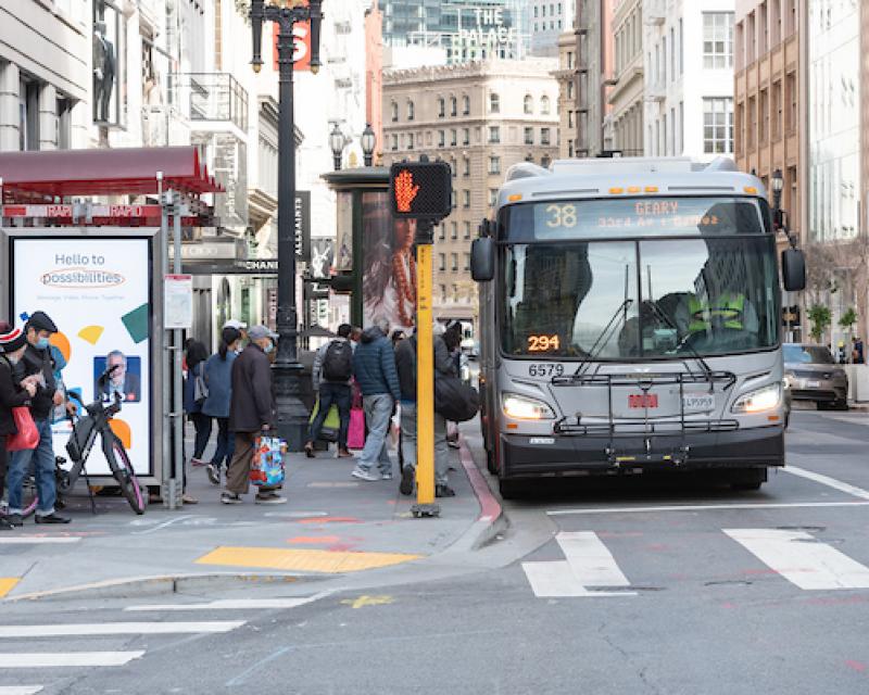 People board a 38 Geary bus