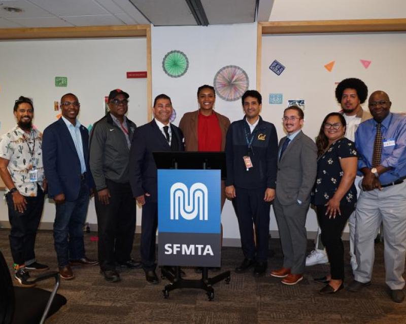 picture of SFMTA employees in front of podium