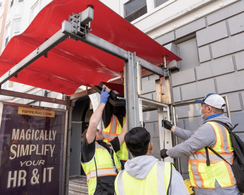 Installation of First New Muni Arrival Prediction Signage in Bus Stop | March 2, 2022