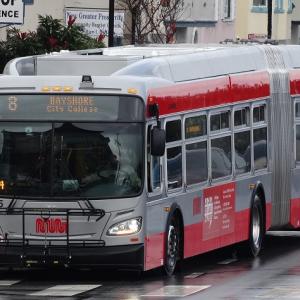 An 8 Bayshore Muni bus traveling on San Bruno Avenue.