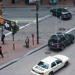 Market Street with streetcar, autos and pedestrians