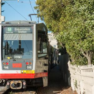 M Ocean View train entering Rossmoor Drive private trackway