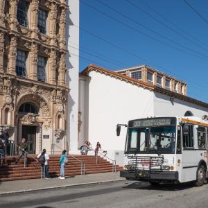 Muni arriving outside of a San Francisco school