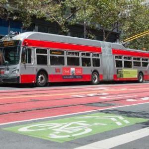 Trolley driving down street