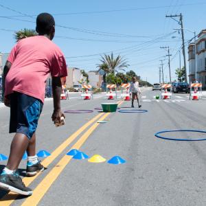Children playing at a Play Streets block party