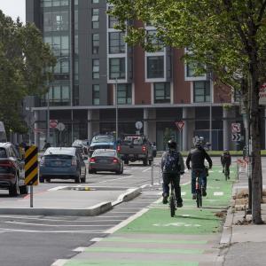 People biking on 8th Street towards Townsend 