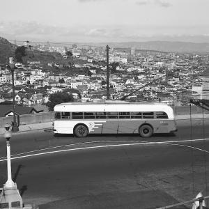 33 ashbury coach with city skyline in background, 1947