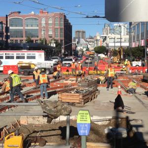 Workers on 4th Street near King