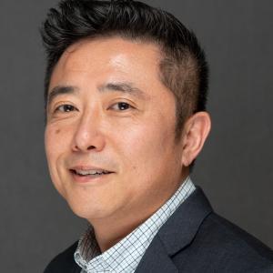 Portrait of Human Resources Manager Derek Kim