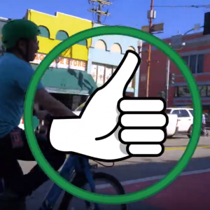 Bicycle heading to curb in red transit lane