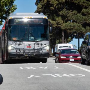 Photo of bus driving in transit lane